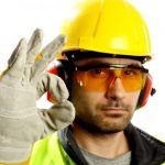 worker in hard hat, gloves and safety glasses