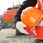 worker with hard hat, gloves & safety vest