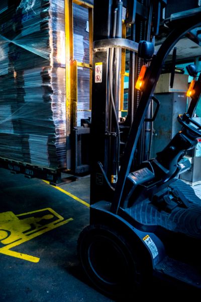 Forklift with visibility lights on for ontario warehouse safety