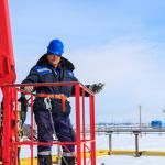 worker in safety gear in aerial lift