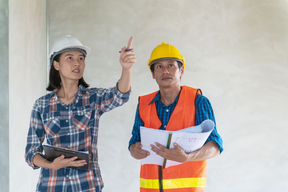 team goes over safety inspection together for worksite safety audit