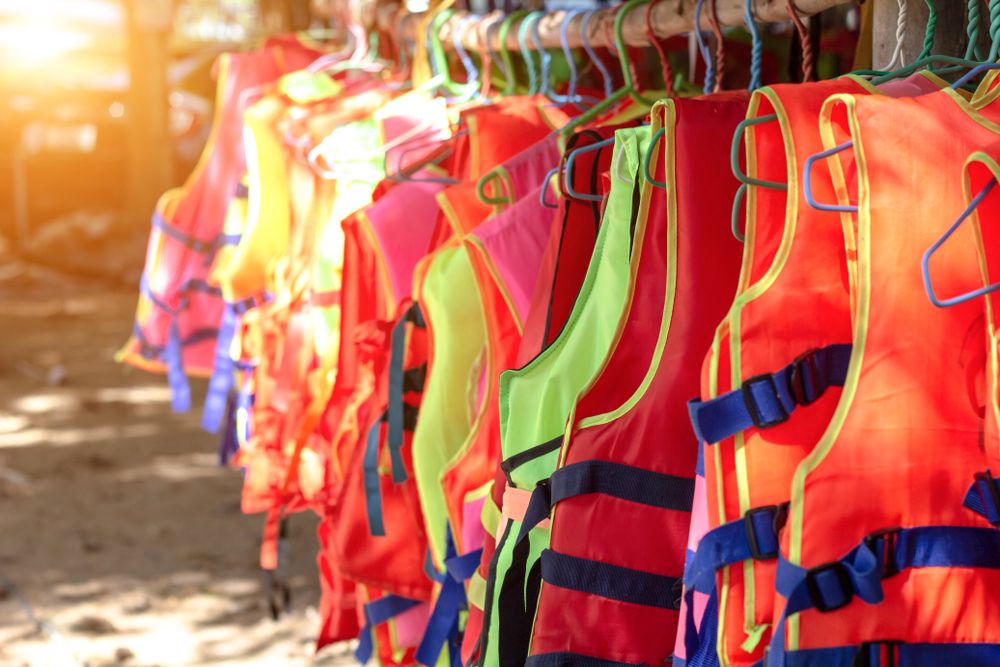 safety vests lined up for workers to wear at job site