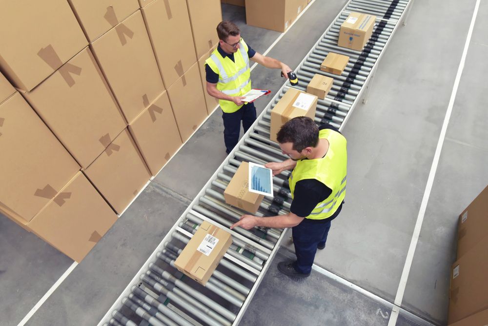 assembly line workers working efficiently
