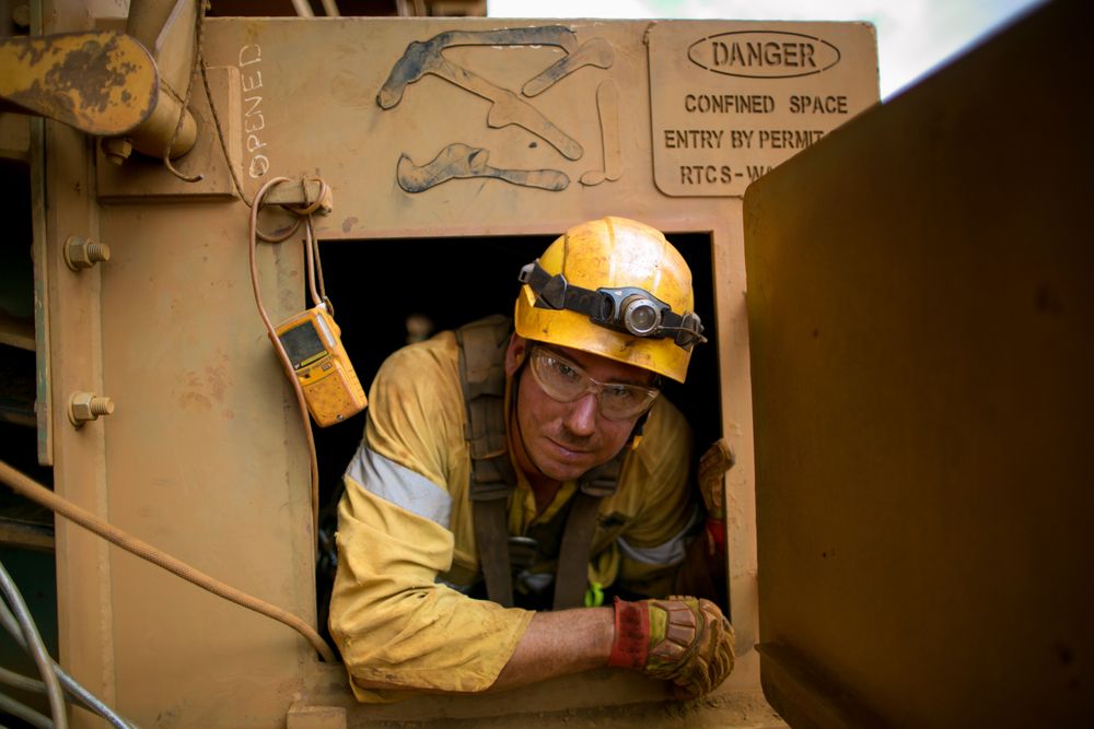 man working in confined space