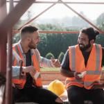 construction workers laughing at work