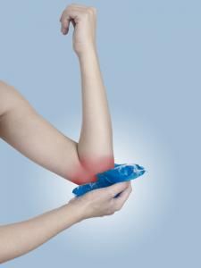 applying ice to elbow suffering from repetitive stress injury
