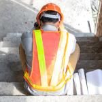 construction worker feels stress at workplace
