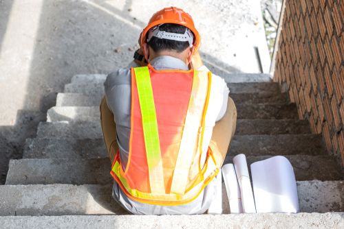 construction worker feels stress at workplace