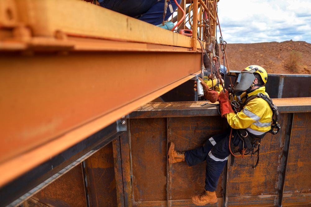 a worker wearing the proper PPE for working at heights