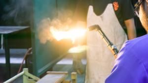 blow torch working in hot conditions