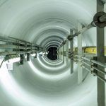 worker looking up in confined space
