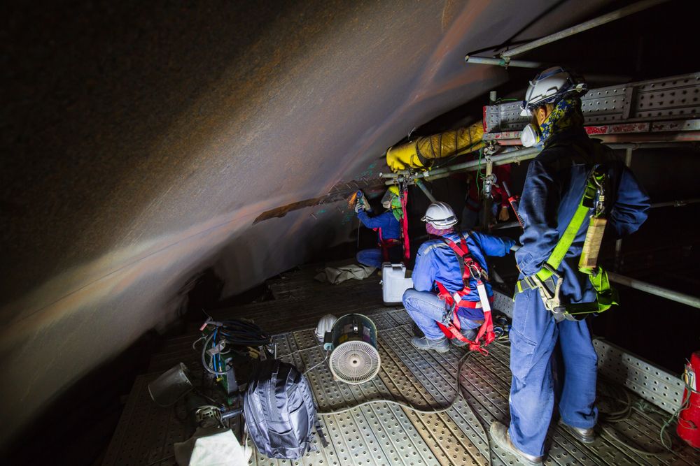 workers at a confined space