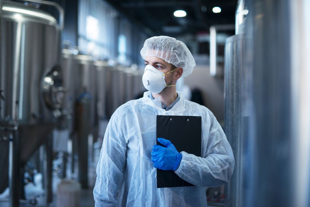 worker in PPE at workplace in ontario