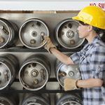 Woman properly storing construction propane in ontario workplace