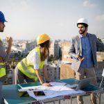 team collaborating at job site
