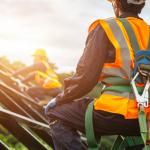 worker wearing PPE to mitigate risk of falling from heights
