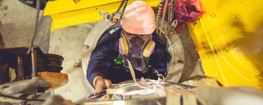 a worker entering a confined space