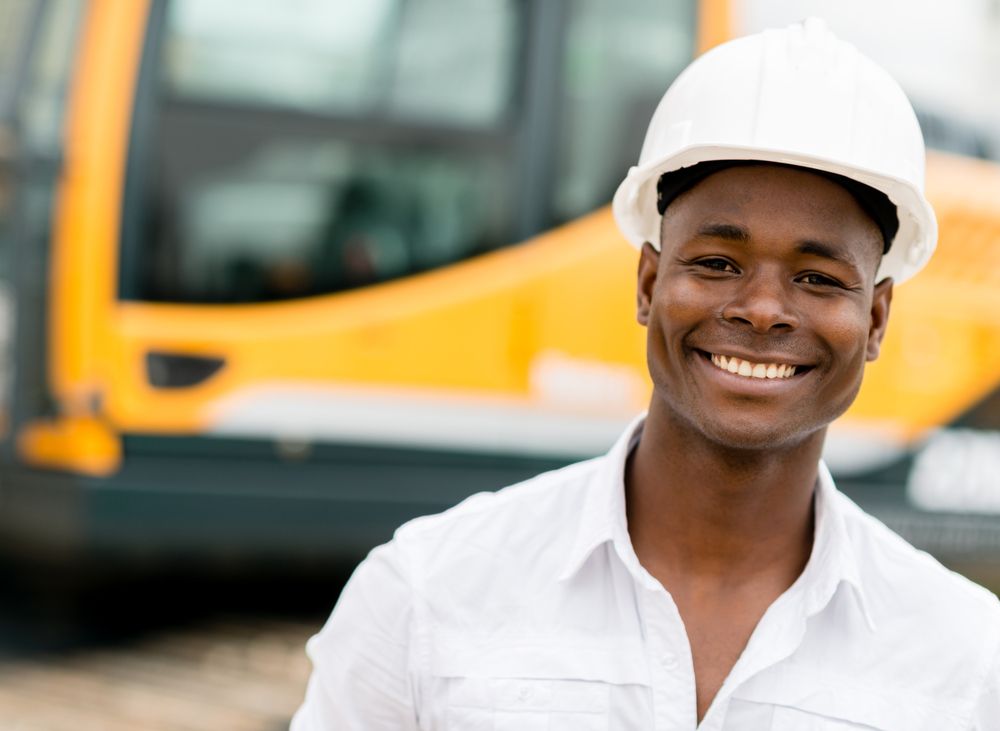 happy man working at construction site