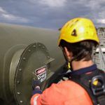 man checking confined space entry