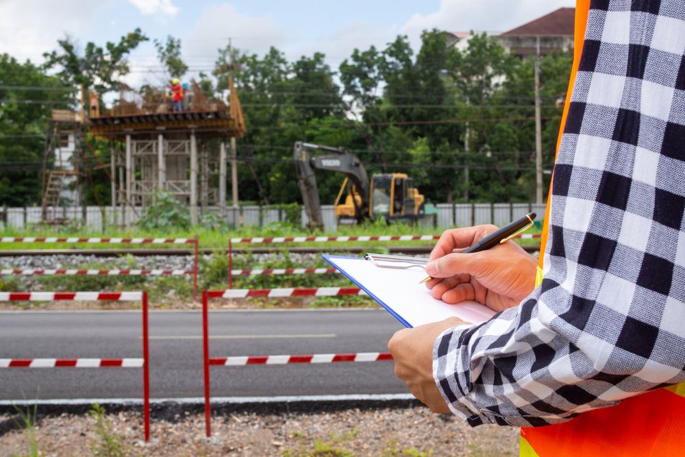 worker in safety vest at job site