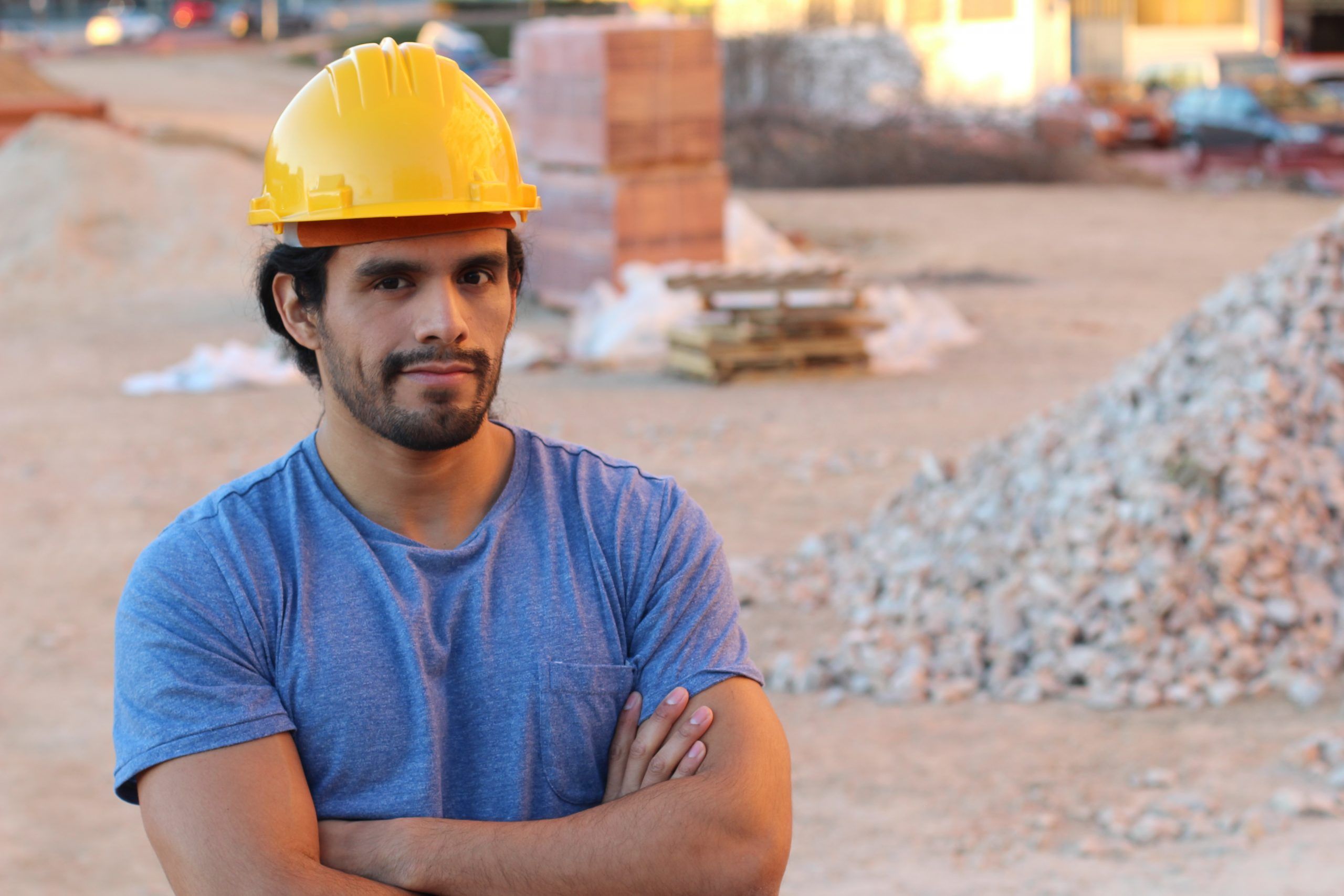 Muscular,Ethnic,Construction,Worker,With,Arms,Crossed
