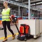 woman doing material handling at warehouse