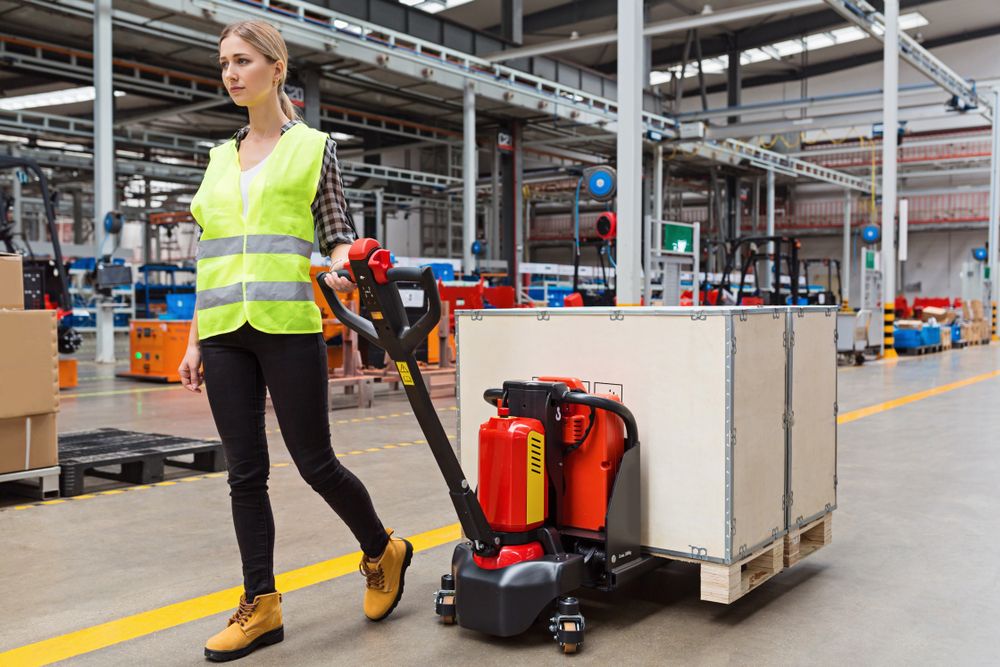 woman doing material handling at warehouse