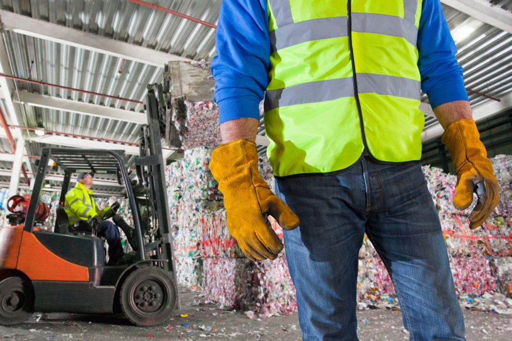worker in safety vest in workplace