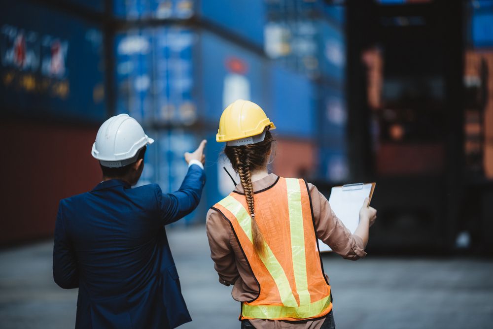 employer and supervisor discussing safety protocols