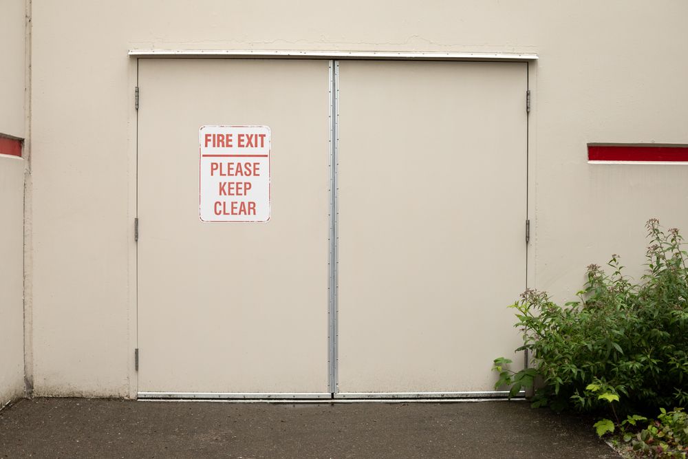 fire exit door outside of a warehouse