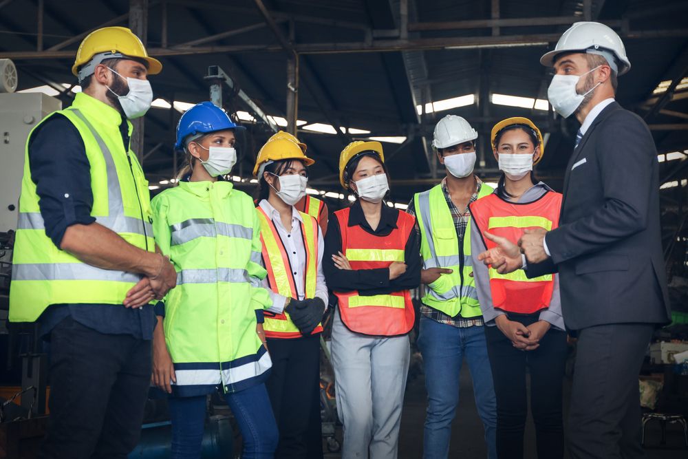 Leader,Or,Manager,Meeting,With,Engineer,And,Technician,While,Line joint health and safety committee meeting