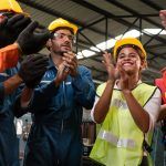 Group of workers celebrating