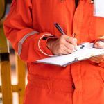 workplace hazards and risk assessment being conducted by a professional