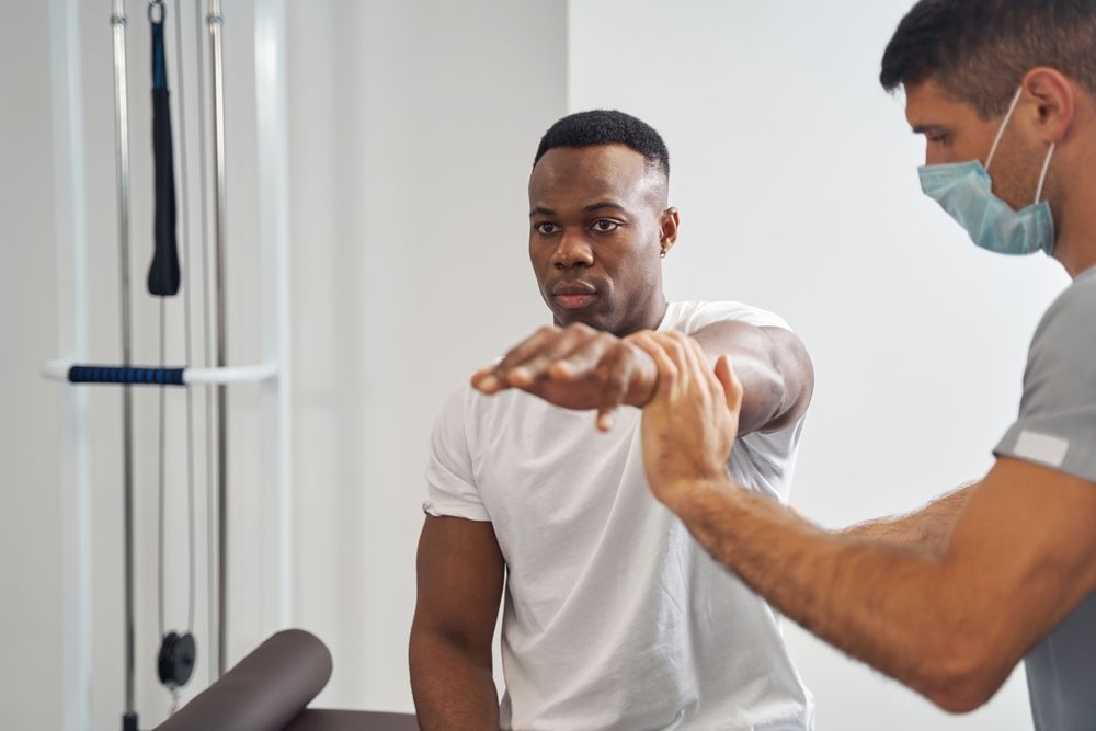 a construction working going through a physical assessment before beginning a job
