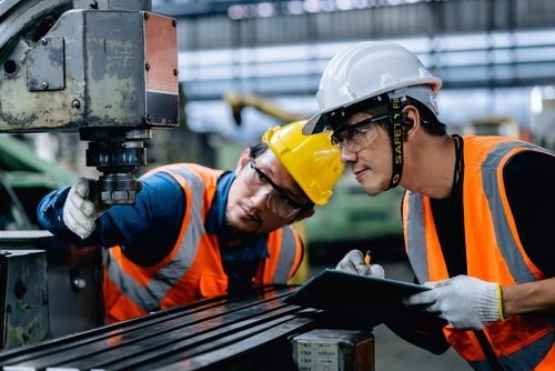 two men optimizing workplace performance