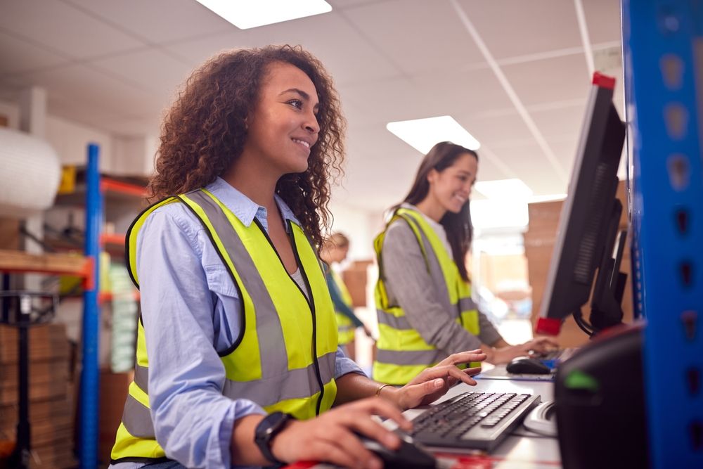 warehouse workers completing whmis safety training online