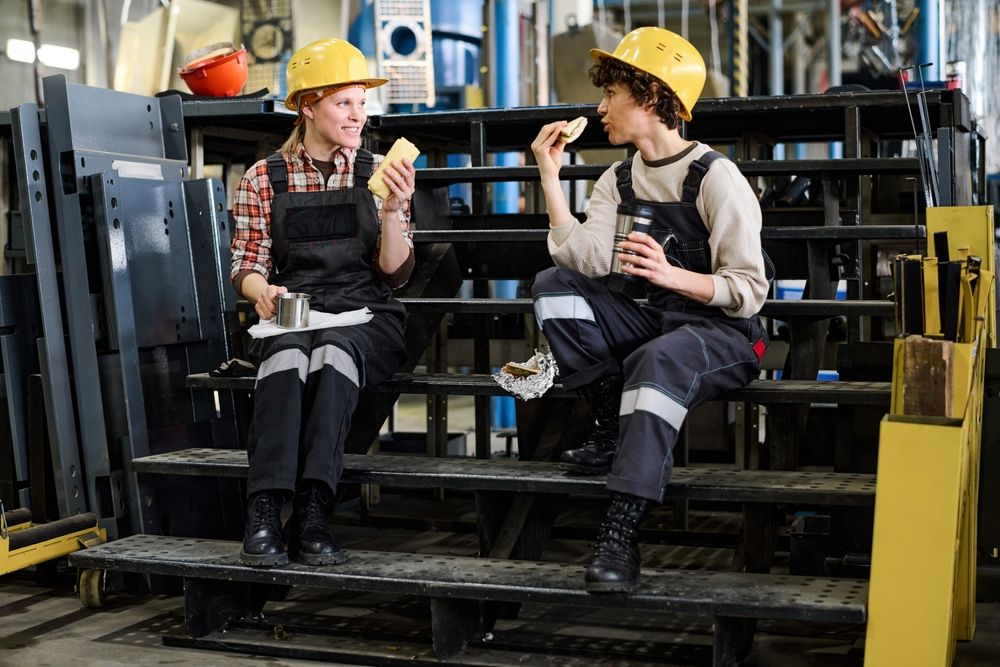 two coworkers eating a nutritious snack