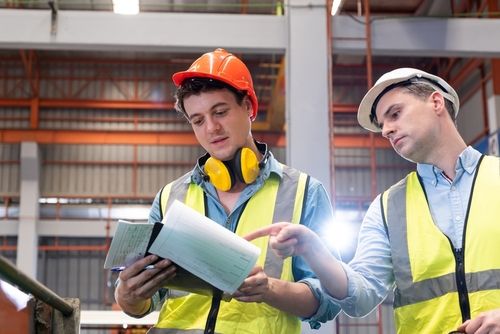 Mechanical Engineers Wearing Safety Equipment for Workplace Safety Audit