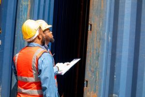 Two,Attractive,Black,Workers,In,Safety,Helmets,And,Uniforms,Work