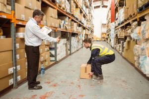 safety training in warehouse onsite showing how to lift