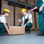 workers lifting a box