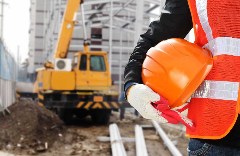 worker with helmet at work site