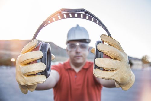worker showing proper ear protection ppe