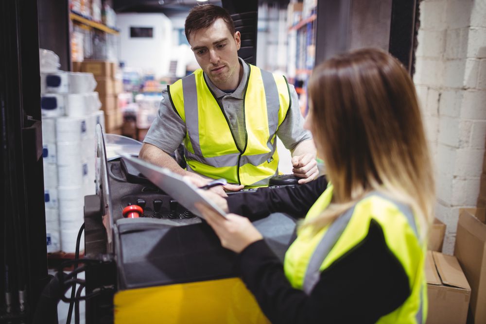 a manager overlooking tasks to ensure safety in the workplace