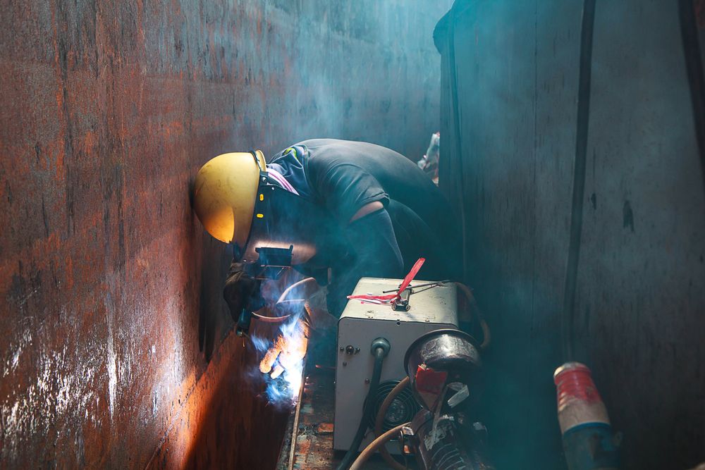 man working in confined space