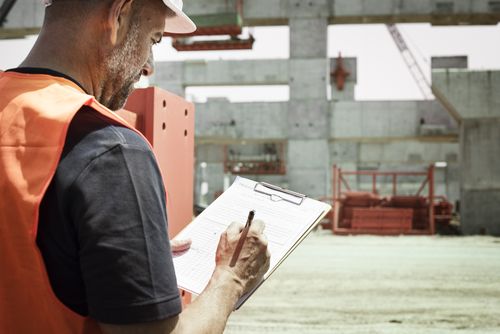 supervisor assesses workplace safety