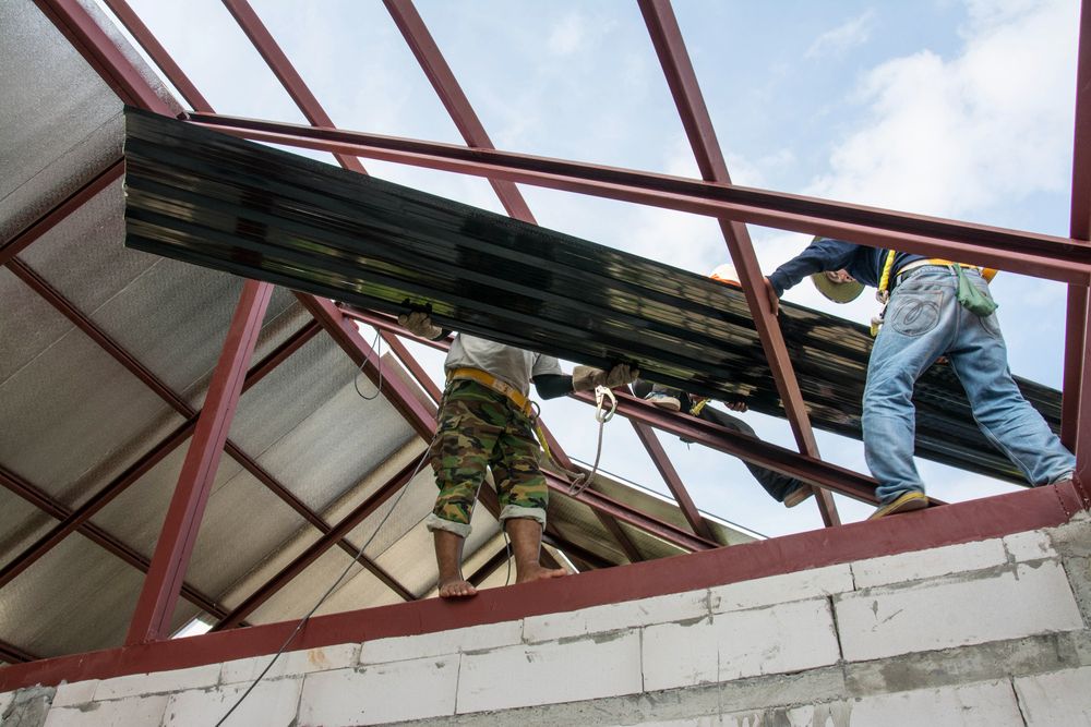 men working on roof