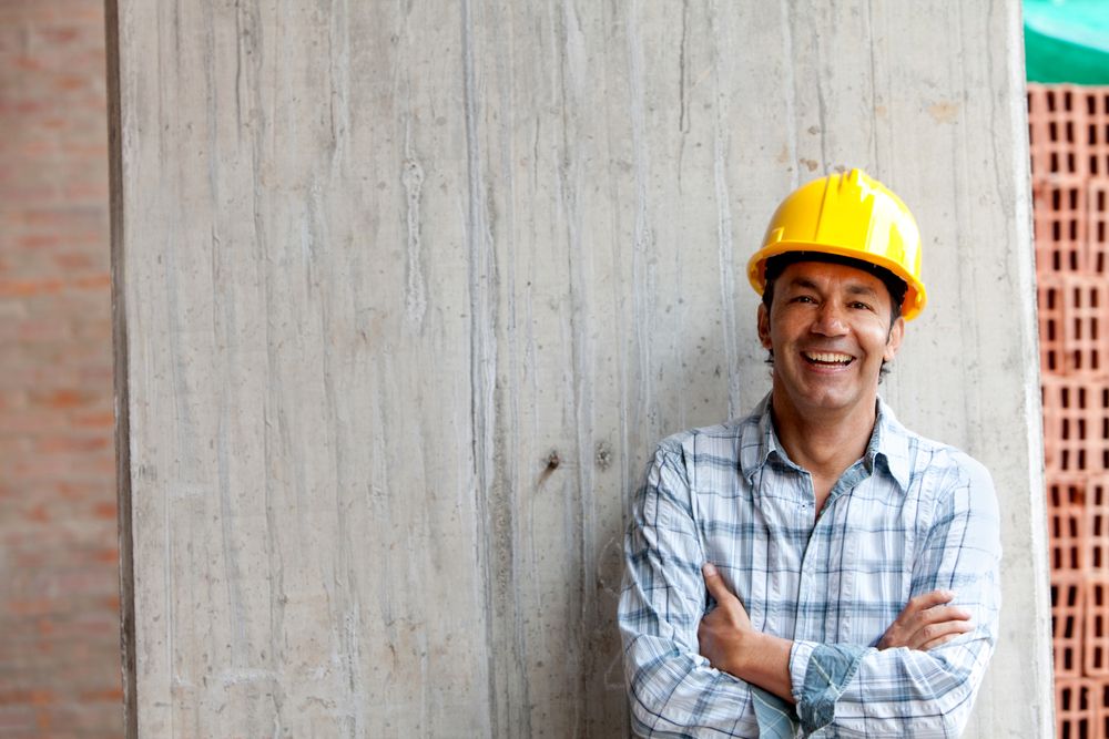 happy man working at construction site