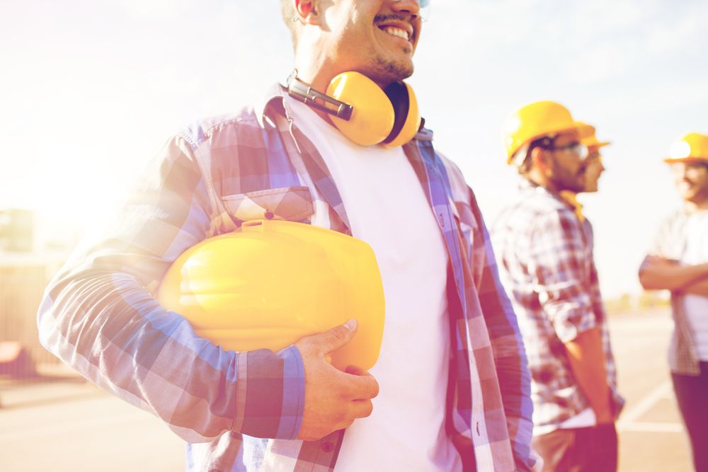 workers at job site in ppe