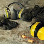 various types of ppe personal protective equipment: gloves, shoes, ear protection